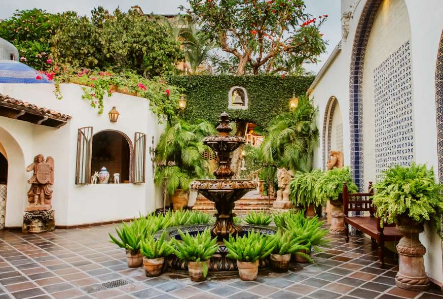 Our Story is About Us at Hacienda San Angels courtyard fountain.