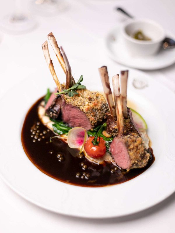 Gourmet dining includes dishes like these lamb chops on a bed of mashed potatoes